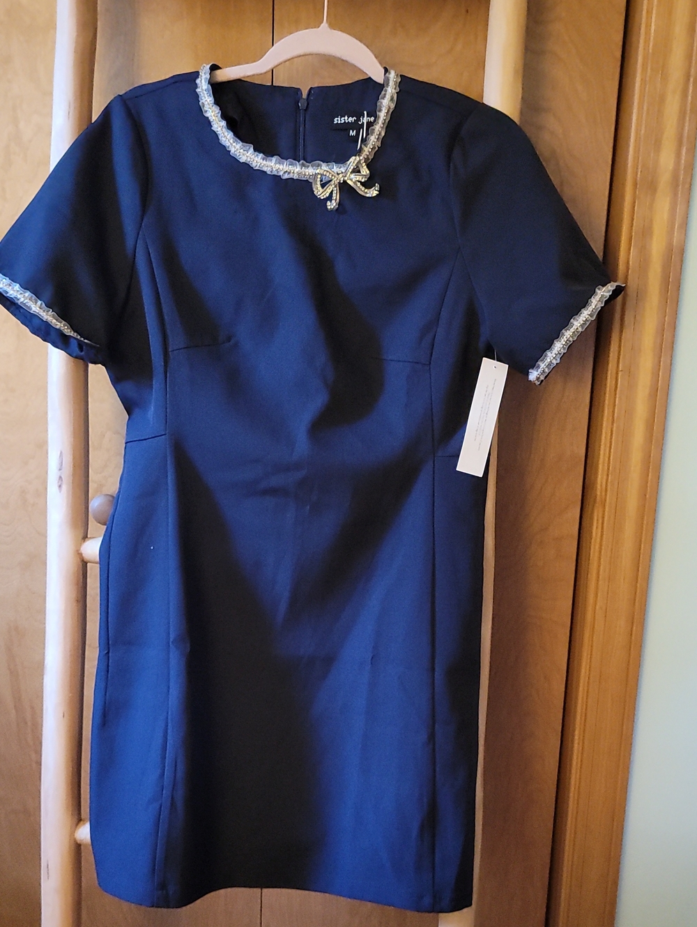 Sister Jane Navy Sheath Dress with Gold-Trim Bow